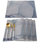 serviettes table moderne élégantes marbre blanc or bleu rose veines dorées lin respectueuses environnement