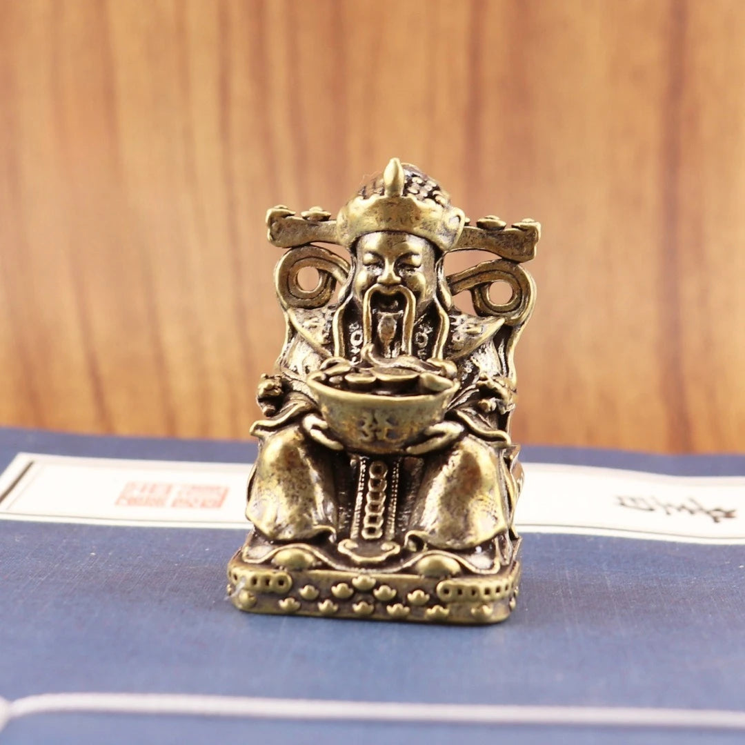 statue decorative homme assis bronze doré reliefs detailles aspect vieilli traditionnel asiatique decoration prospérité