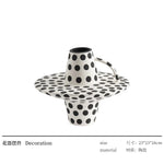 vase céramique moderne blanc noir orange motifs abstraits points bibliothèque décoration