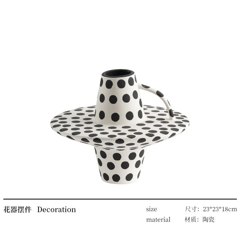 vase céramique moderne blanc noir orange motifs abstraits points bibliothèque décoration