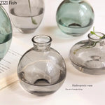 vases hydroponiques modernes transparents marron lisses décoration table plantes fleurs artificielles minimalistes
