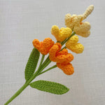 décoration intérieure multicolore fleurs tricotées artisanale jaune vert rose blanc violet tricot