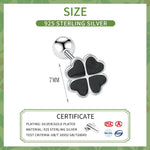 Boucles d'oreilles argent 925 trèfle porte-bonheur noir plante vue de côté