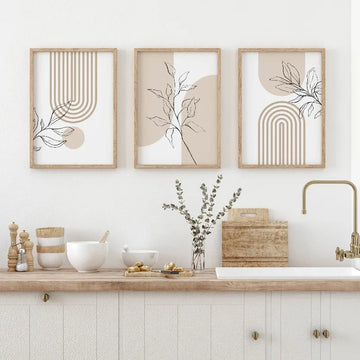 tableaux modernes minimalistes toile lignes géométriques feuilles stylisées beige noir blanc chambre salon