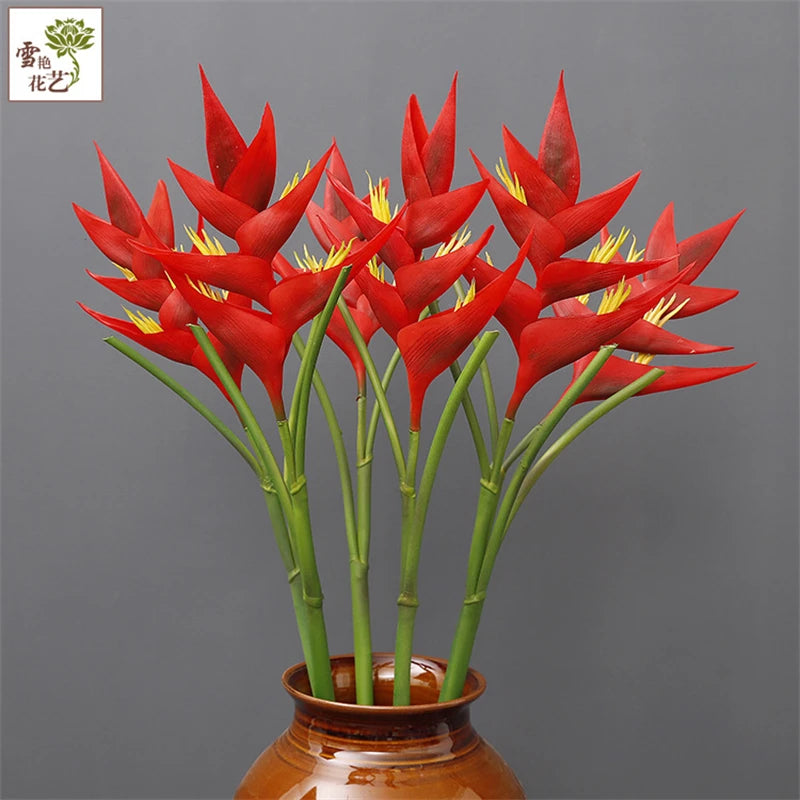 bouquet fleurs artificielles exotiques orange rouge rose violet feuilles vertes moderneintérieur décoration vase