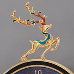 horloge murale moderne or bleu cerf décoration festive salon round métal doré