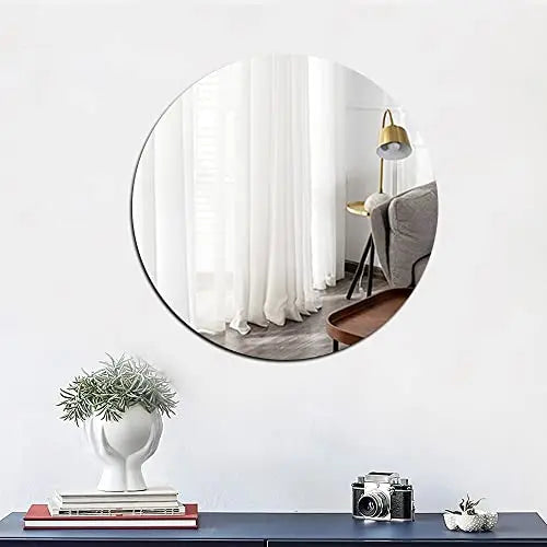 Miroir mural acrylique rond elliptique couleur argent sur mur blanc