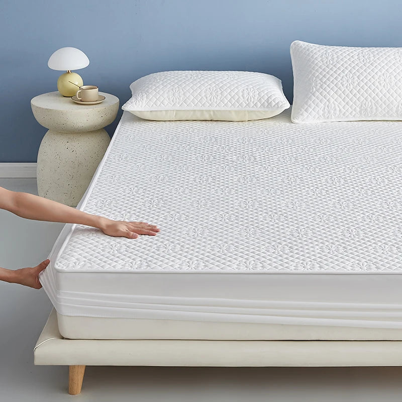 Housse de matelas imperméable 140x200 couleur unie sur lit