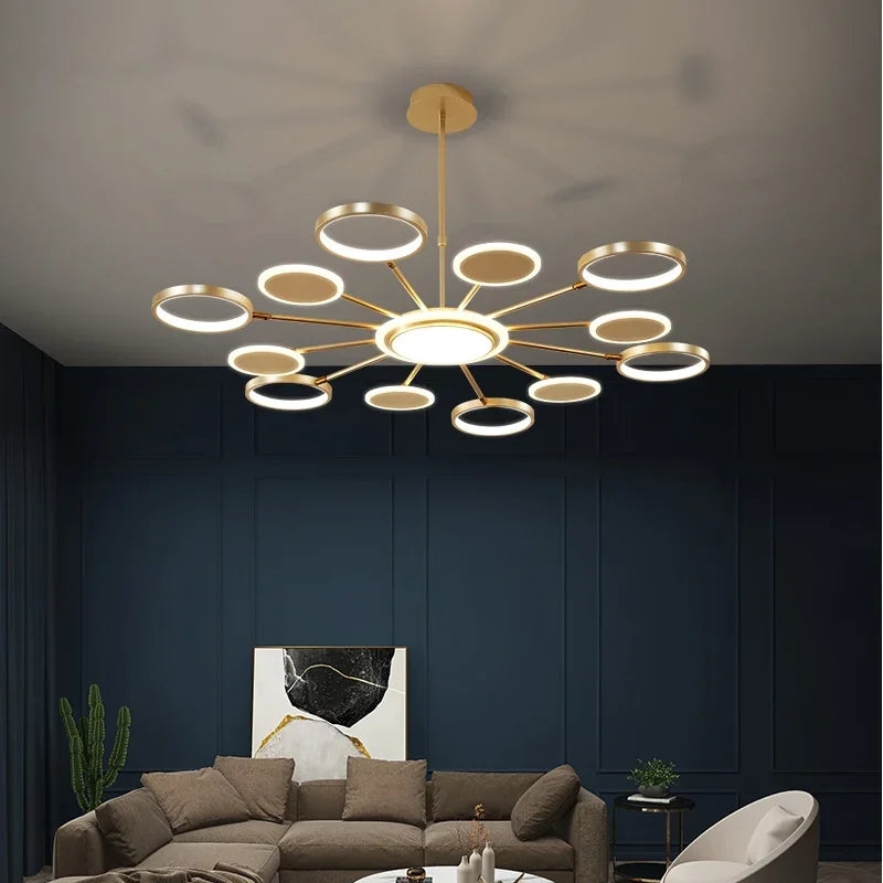 lustre suspendu moderne scandinave anneaux dorés luminaire salon luxe lumière chaude
