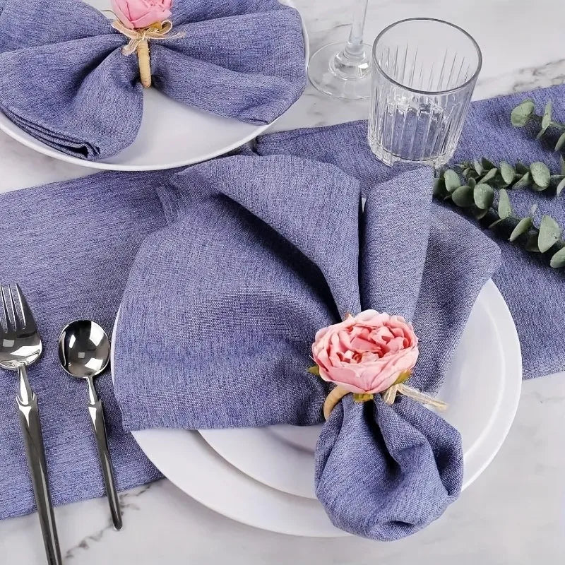 porte serviettes décoratifs jute fleurs rose serviettes tissu assiettes motifs géométriques verres transparents rustique