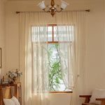 rideaux dentelle beige motifs géométriques bohèmes triangles fleurs vase vintage translucides franges chambre