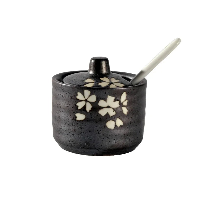 pot condiments porcelaine broyeur épices cuillère fleurs blanches motifs floraux rustique