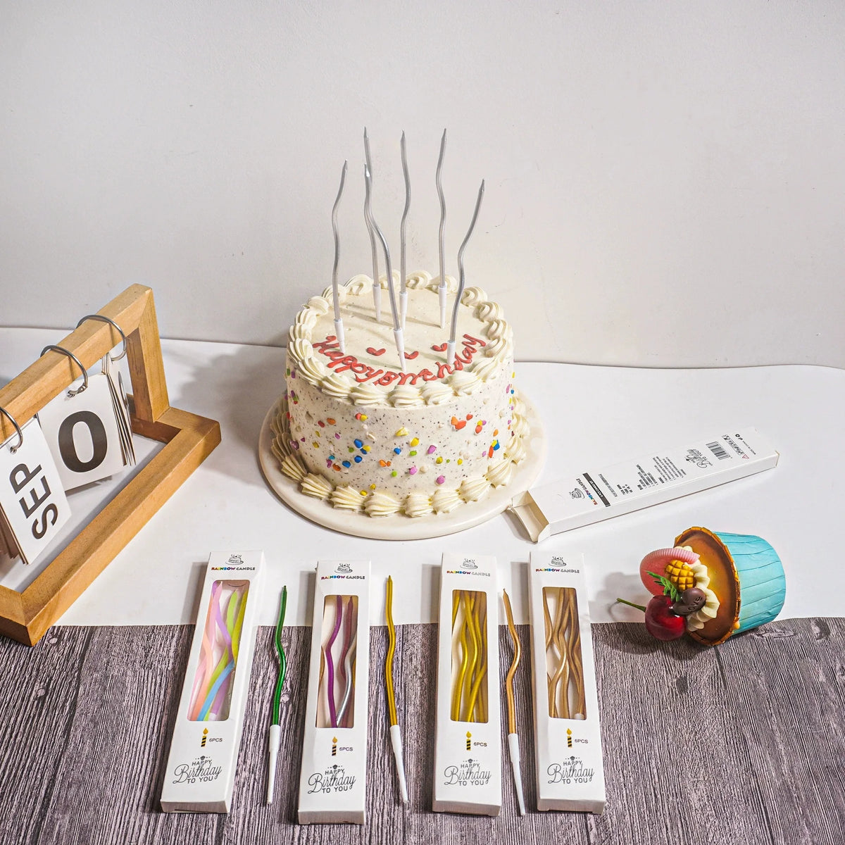 bougies gâteau multicolores twistées modernes boîtes présentation happy birthday base plastique