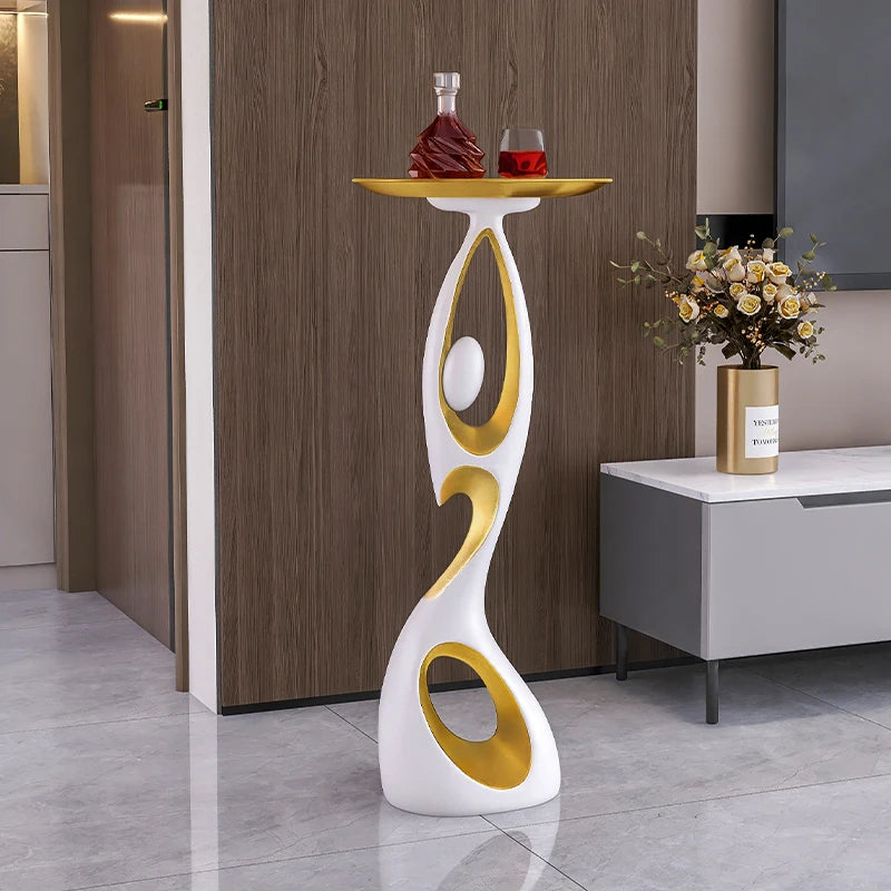 table basse moderne artistique plateau rond noir or blanc