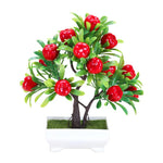 décoration intérieure arbre artificiel bonsaï pot blanc feuilles vertes fruits rouges tronc brun