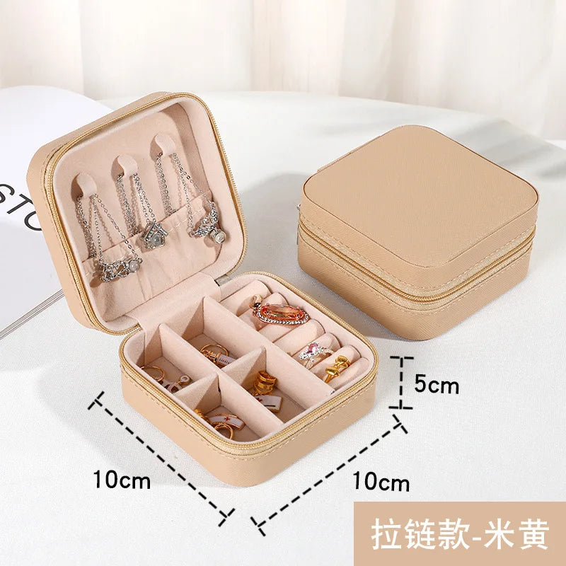 boîte bijoux cuir pu noir rose blanche bleue moderne compact glissière rangement bijoux