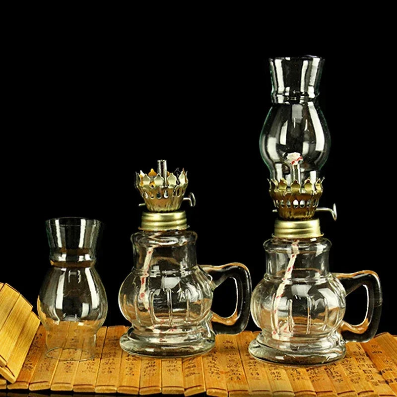 lampe huile vintage transparente verre texturé ancien source lumière douce chaleureuse