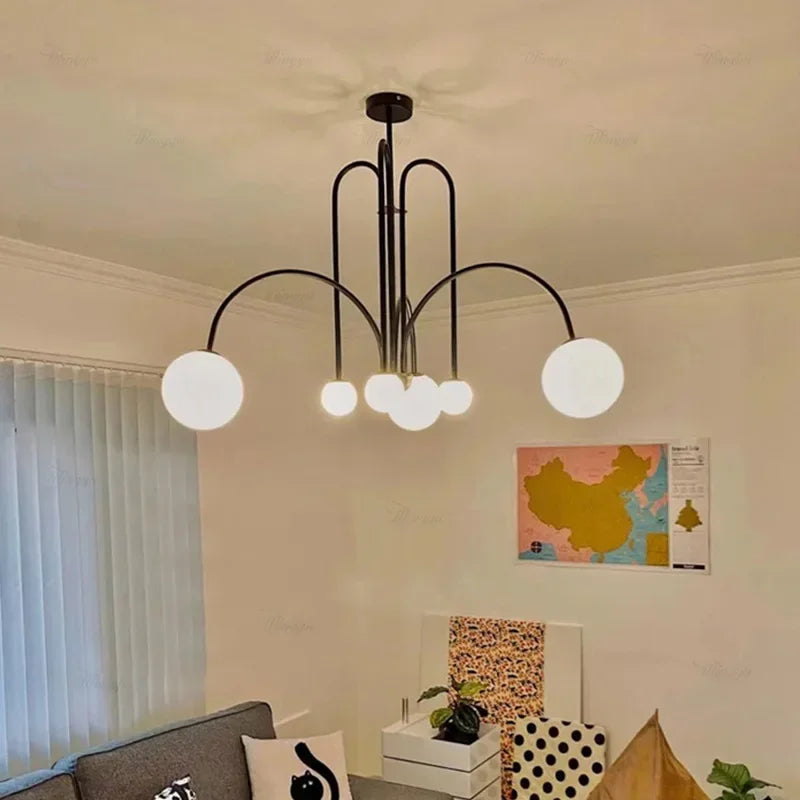 suspension lumineuse moderne sphères translucides structure métallique or rouge brun lumière led chambre salon