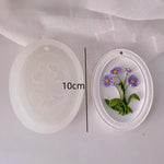 cadre décoratif ovale silicone fleurs reliefs artisanal clips ruban couleurs variées maison