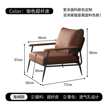 fauteuil moderne minimaliste vert noir bois clair coussin motif géométrique salon chambre decoration meubles