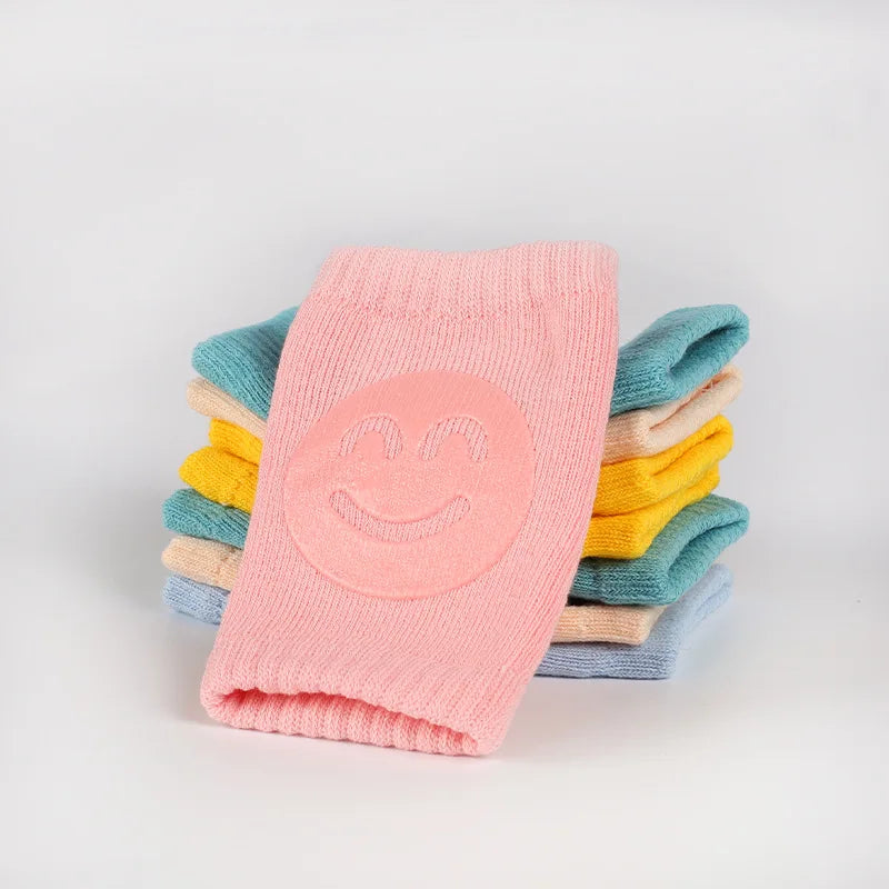 protège genoux bébé coton acrylique unisexe bleu clair jaune rose gris vert smiley brodés