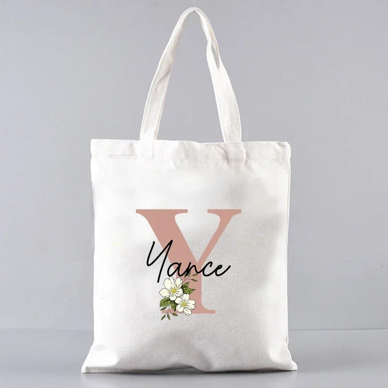 sac main femme toile blanche motif fleurs lettres grandes poignées réutilisable moderne