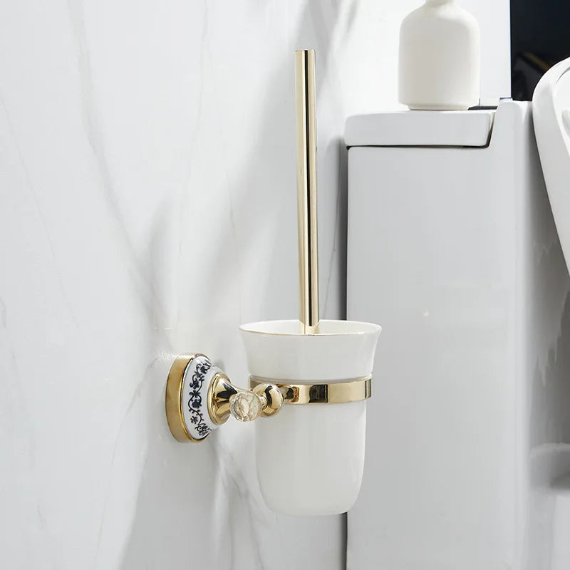 ensemble d'accessoires salle bain or blanc bleu motifs floraux anneau serviette porte papier toilette