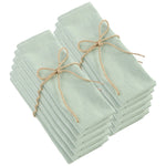 serviettes table coton vert pastel texture rugueuse rustique élégant papillon doré épingle blé