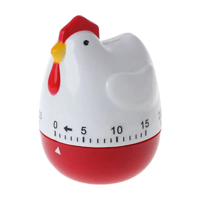 Minuterie de cuisine en forme de poule blanche sur plan de travail moderne