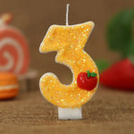 bougies numeriques jaune paillette pomme rouge anniversaire decoratif thème feuille verte paillettes dorées tringle