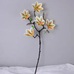 Branche artificielle magnolia fleurs simples feuilles vertes blanc rose jaune verte decoration intérieur