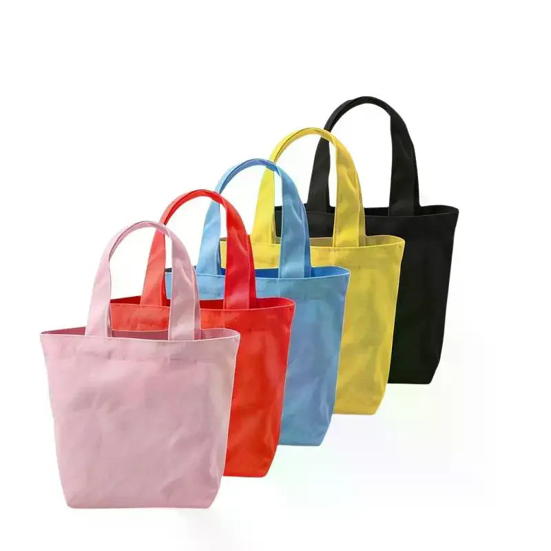sac main uni moderne poignées jaune rose bleu rouge noir blanc nylon