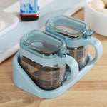 boîtes épices transparentes verre moderne rose verte bleu poignées couteau service herbes condiments cuisine