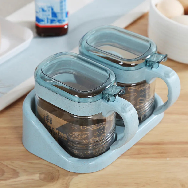 boîtes épices transparentes verre moderne rose verte bleu poignées couteau service herbes condiments cuisine