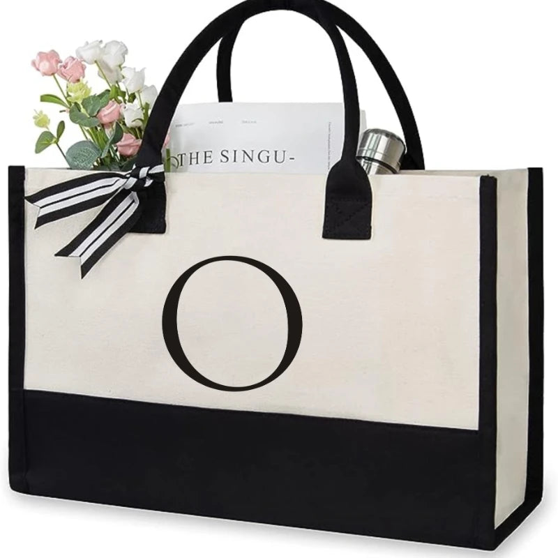 sac main toile lettre imprimée blanc noir rubans classique poignées intérieur noir zippé capacitaire