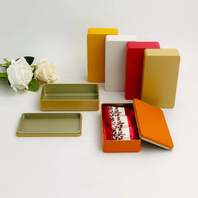 boîte rangement métal réutilisable contenant thé bijoux organisation moderne orange intérieur beige