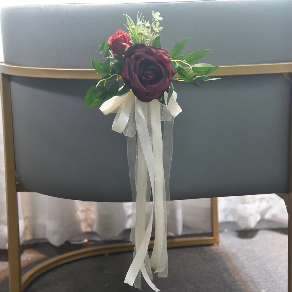 décoration mariage rose artificielle ruban eucalyptus feuilles verte chaise égliseextérieur