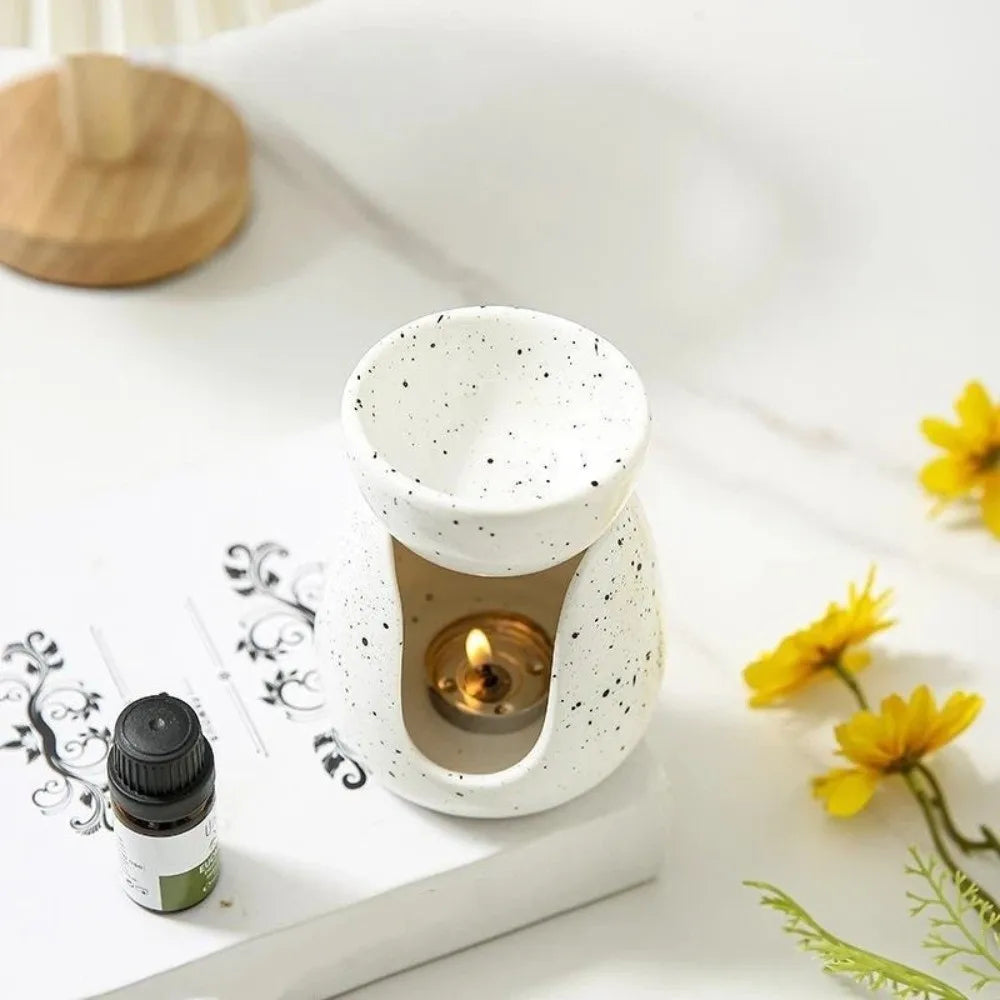 diffuseur huiles essentielles blanc taches noires minimaliste moderne facile entretien bougie flacon