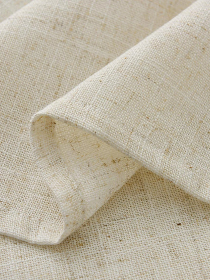 Tissu beige naturel de haute qualité pour décoration intérieure, idéal pour la confection de rideaux et housses d'ameublement, offrant un style élégant et épuré pour rehausser tout intérieur moderne.
