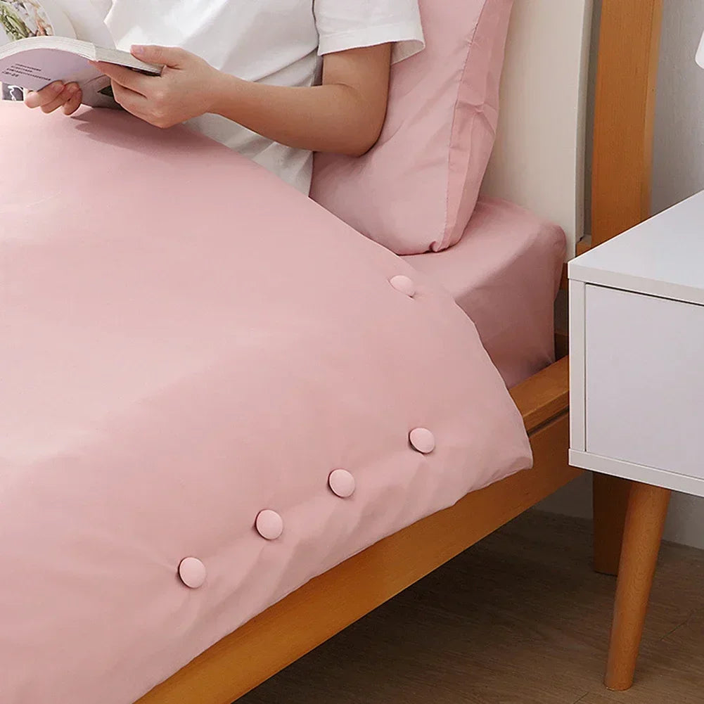 boutons lit antidérapants plastique moderne rose gris bleu blanc adhésifs sécurisés housse couette