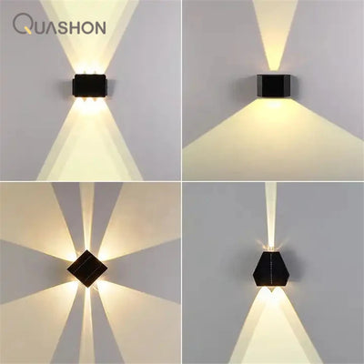 Applique murale solaire LED blanche installée sur un mur de jardin