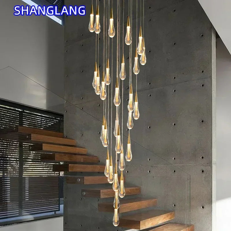 suspension lumineuse moderne cristal doré transparent gouttes verre led