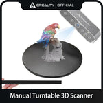 Plateau tournant manuel rouge pour scanner 3D sur fond blanc