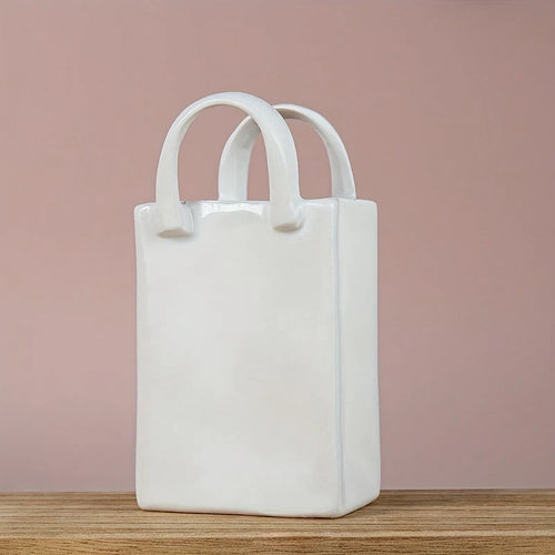 vase blanc moderne céramique forme sac main décoration table fleurs séchées minimalisteintérieur arrêté