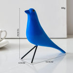 décor oiseau bois peint jaune noir rouge bleu blanc vert pieds métalliques moderne salon