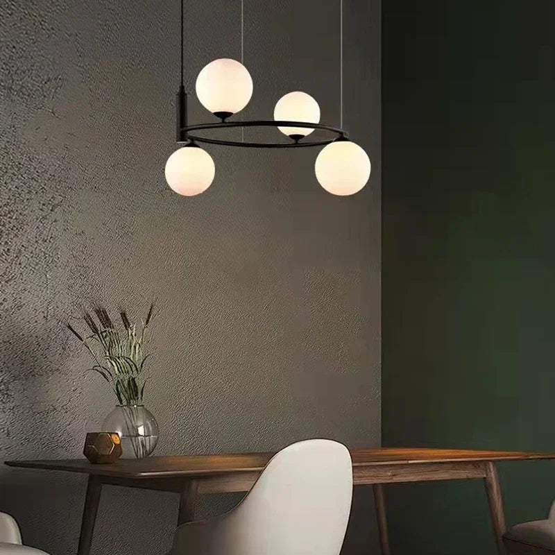 suspension luminaire moderne sphères verre translucides anneau métal doré salon chambre scandinave
