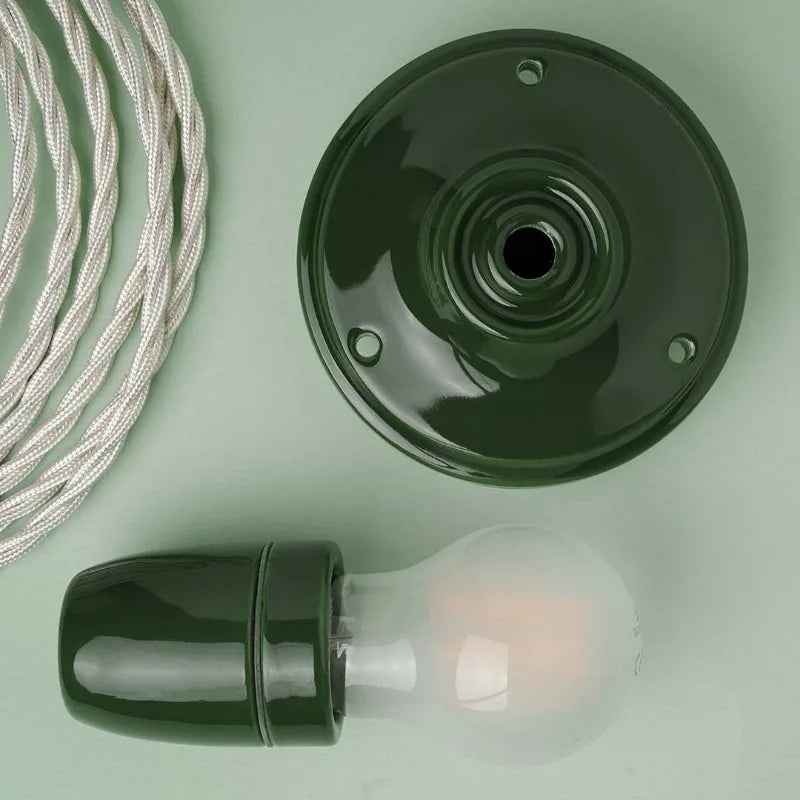 lampe suspension moderne potterie vert foncé noir jaune blanc rond lisse minimaliste