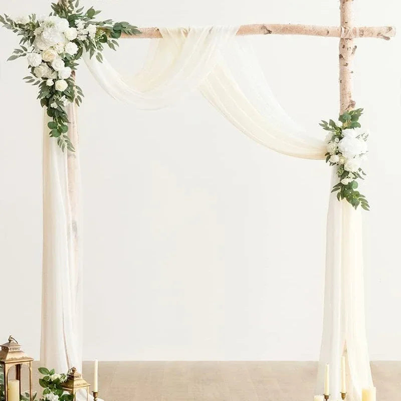arche décorative fleurs artificielles blanc rose feuilles vertes tissu translucide décoration mariage anniversaire extérieur