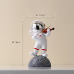 statue astronaute résine saxophone doré guitare violoncelle moderne décoration intérieure chambre salon