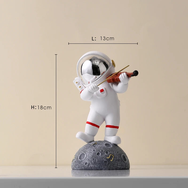 statue astronaute résine saxophone doré guitare violoncelle moderne décoration intérieure chambre salon